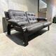 Vintage brown leather two-seater sofa