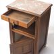 Old pink marble bedside