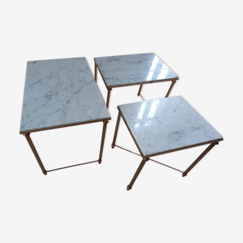 Tables in gilded brass and marble
