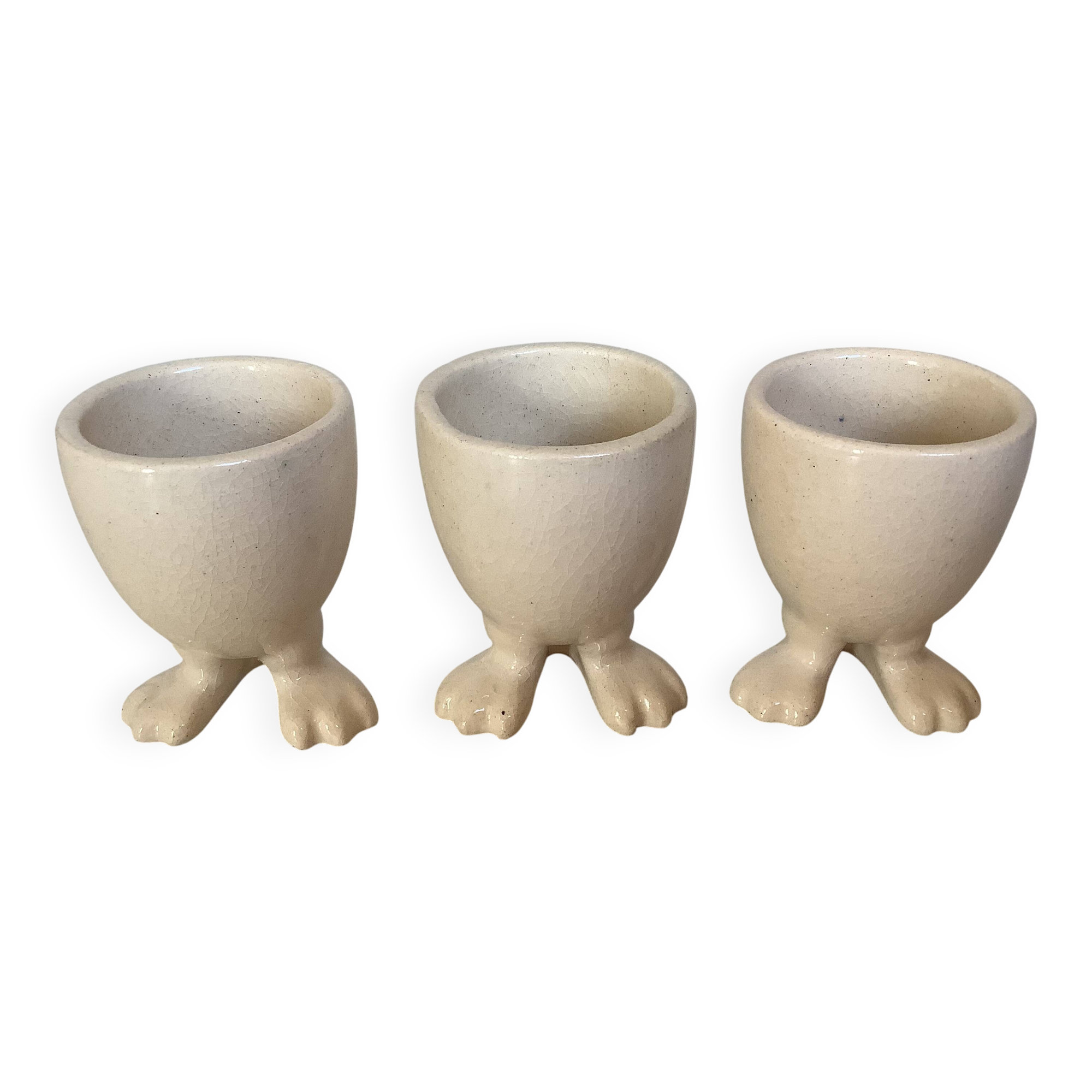 Set of cracked egg cups with feet