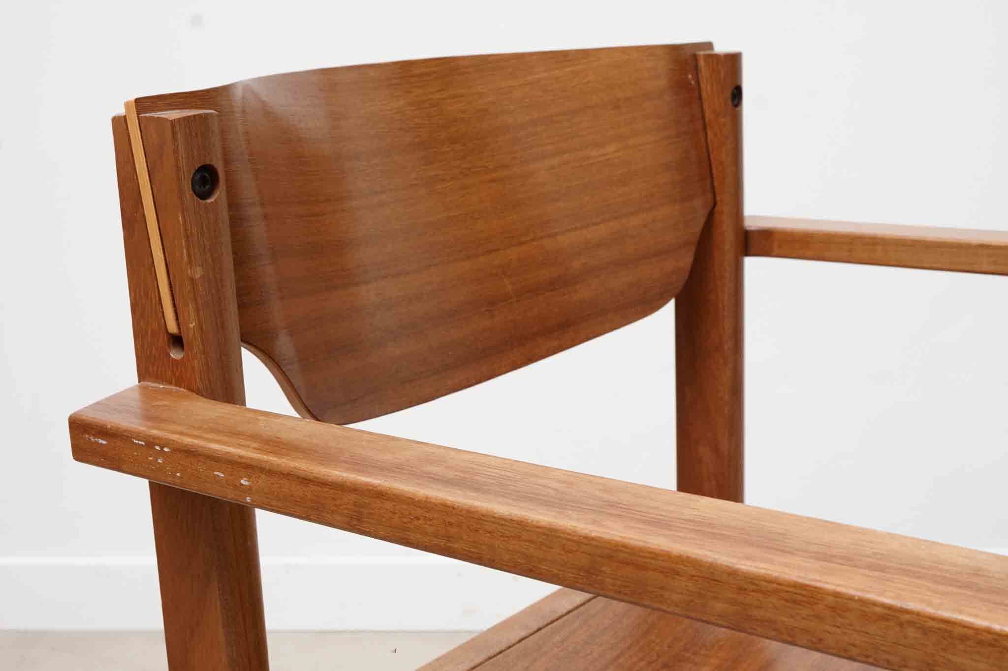 Vintage stackable wooden chair with armrests