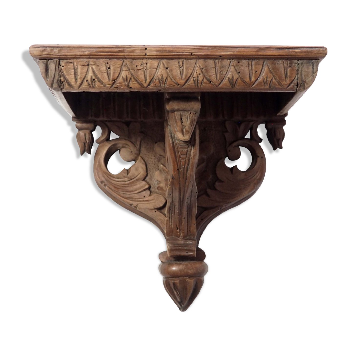Carved wooden shelf