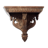 Carved wooden shelf