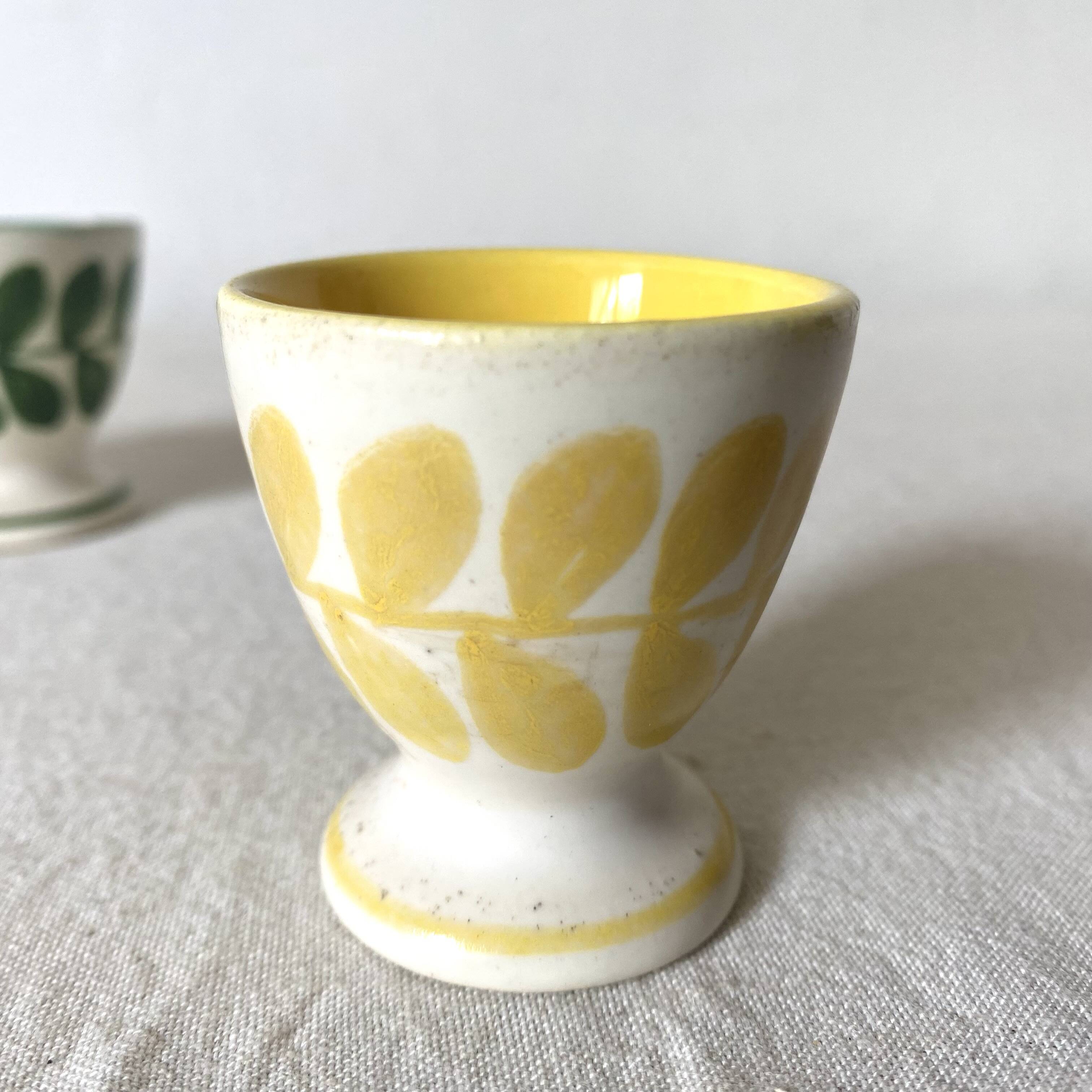 Antique earthenware egg cups
