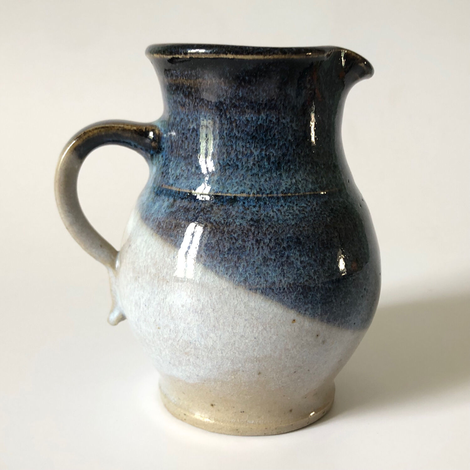 Small pitcher in blue glazed sandstone