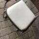 Set of 4 Mid-Century brown faux leather chairs with wood and chrome structure (1970s)