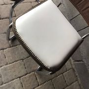 Set of 4 Mid-Century brown faux leather chairs with wood and chrome structure (1970s)