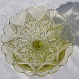 Old small cut on foot in yellow molded glass