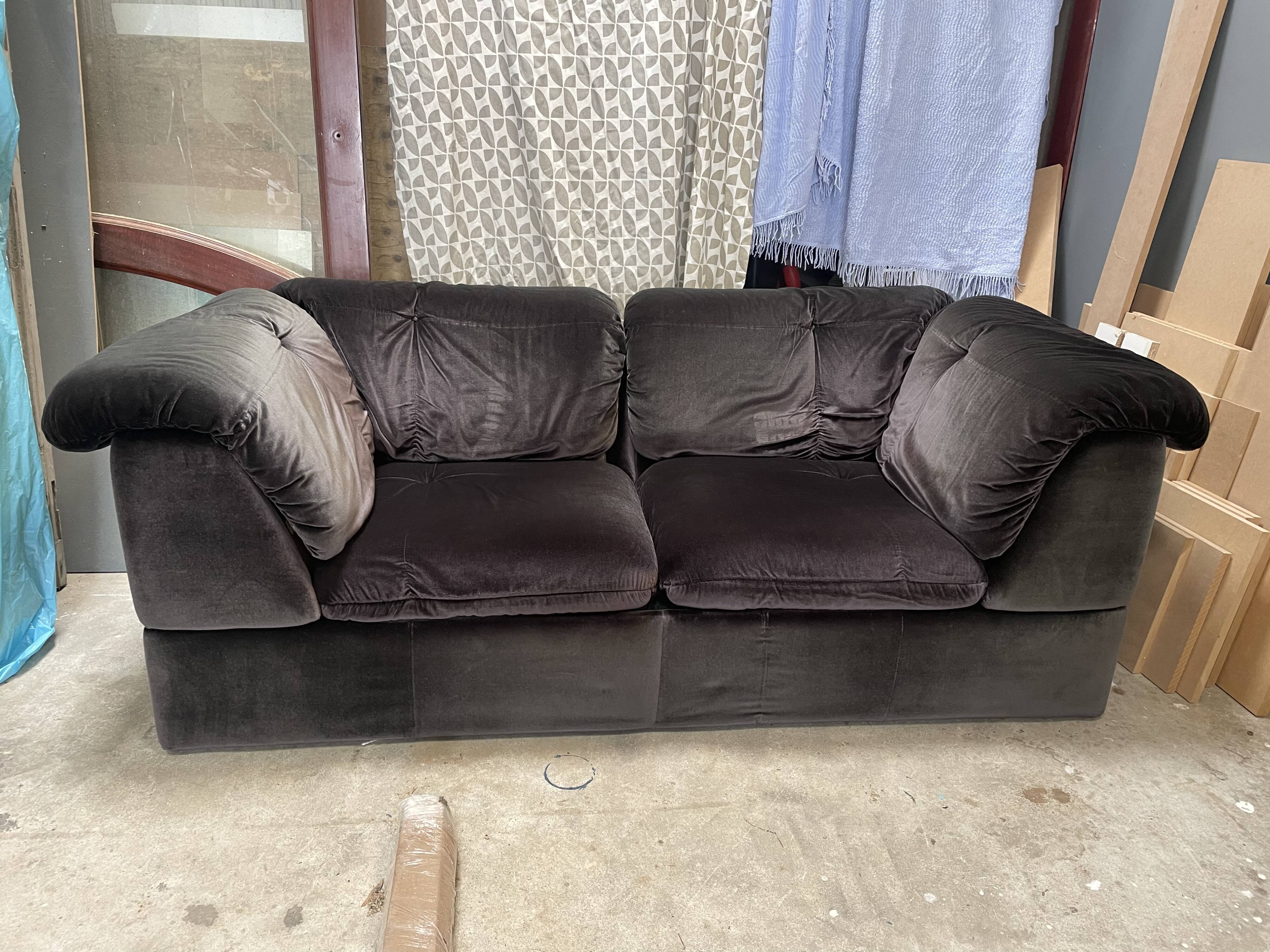 Black velvet sofa