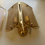 Pair of brass and smoked glass wall lights