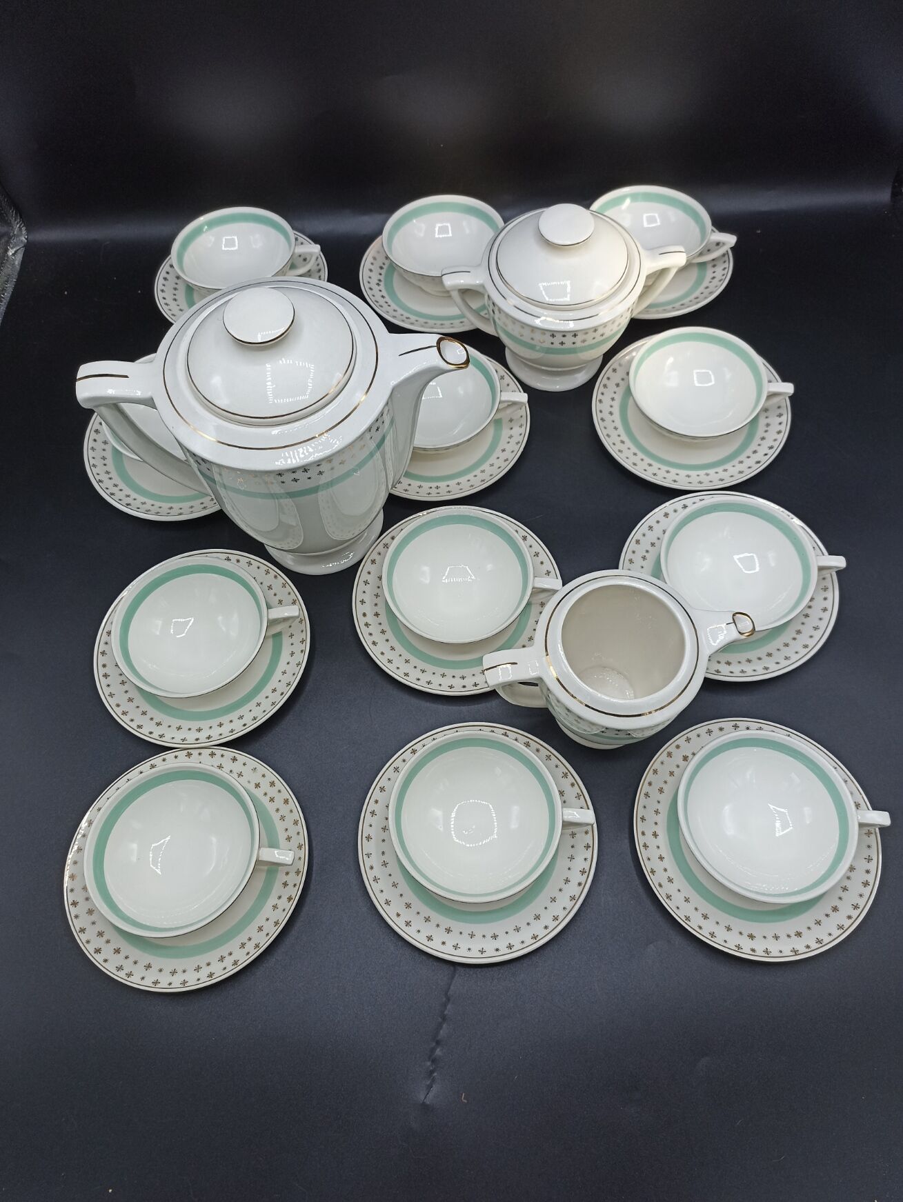 Tea set stars and mint green in semi-porcelain