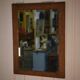 Miroir brutaliste en chêne gougé et verre biseauté 1960’s