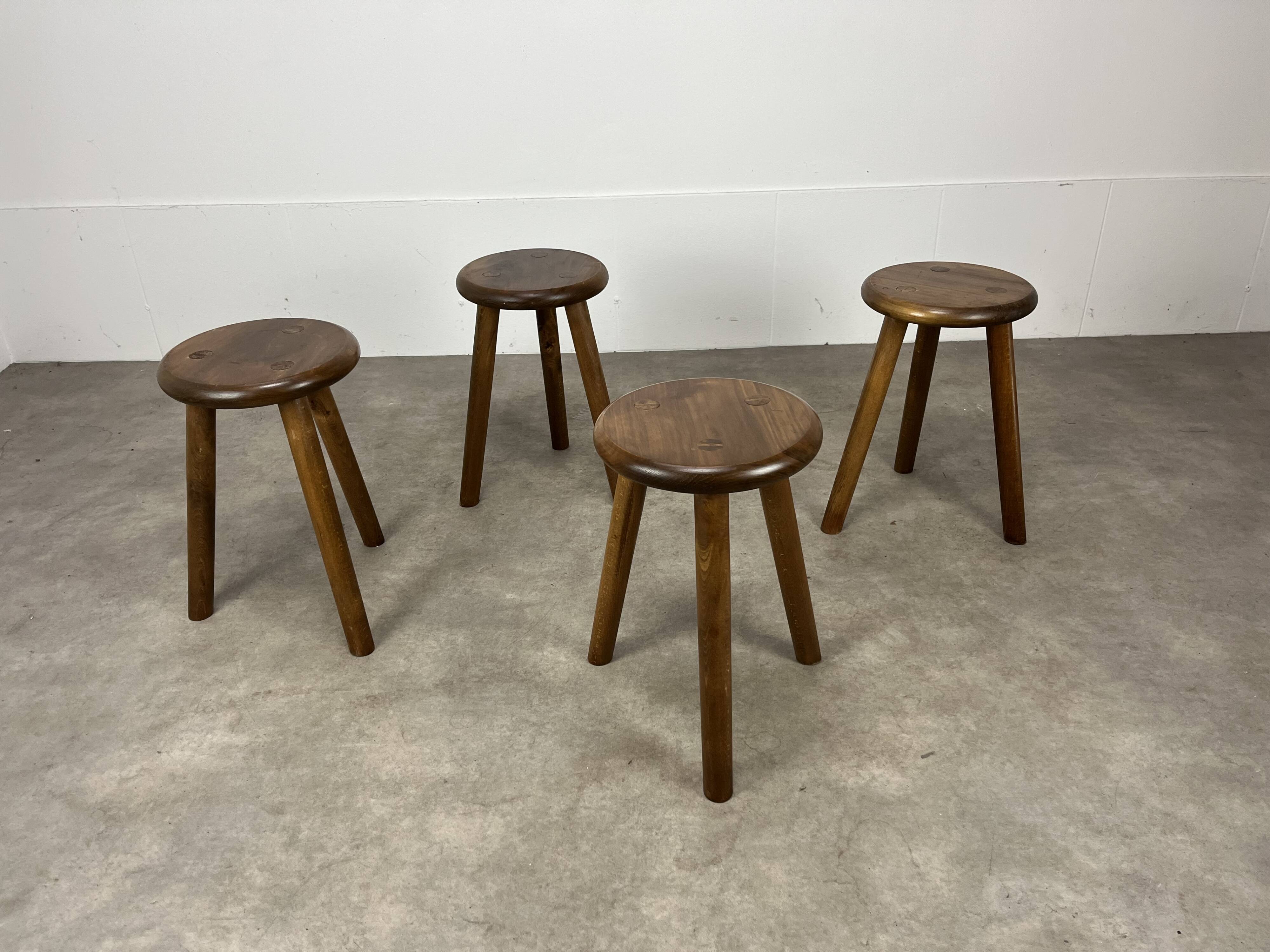 4 wooden tripod stools