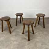 4 wooden tripod stools