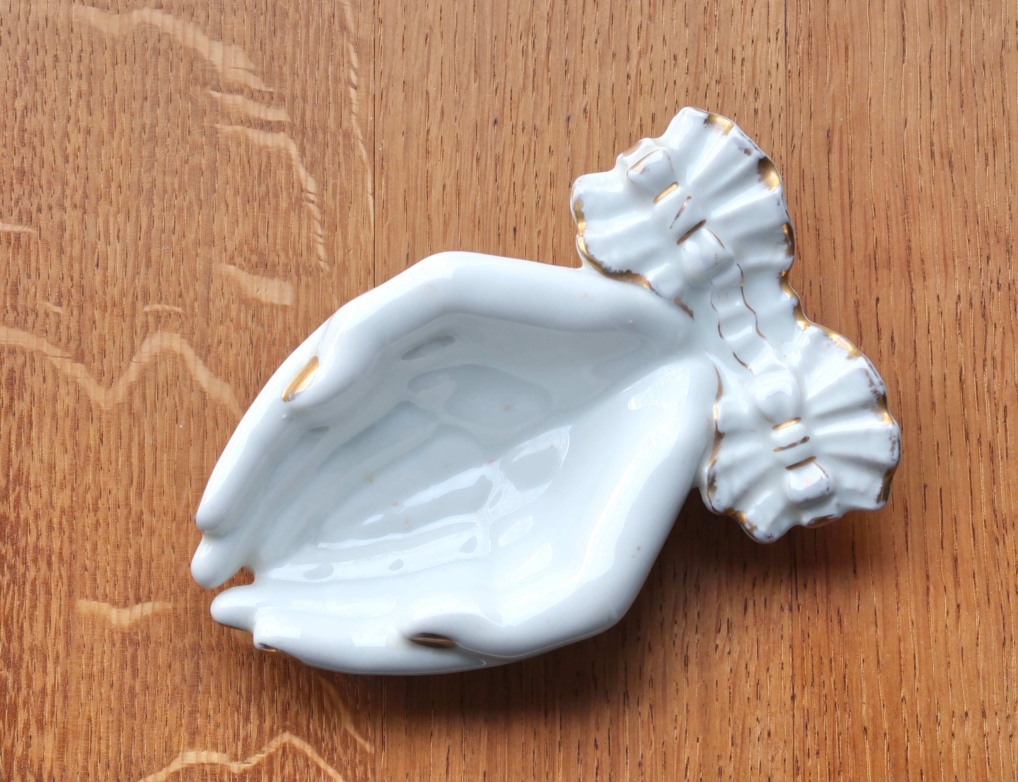 Empty hand pocket in white porcelain, 70s