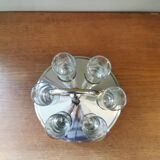 6 shot glasses on vintage metal support