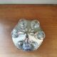 6 shot glasses on vintage metal support