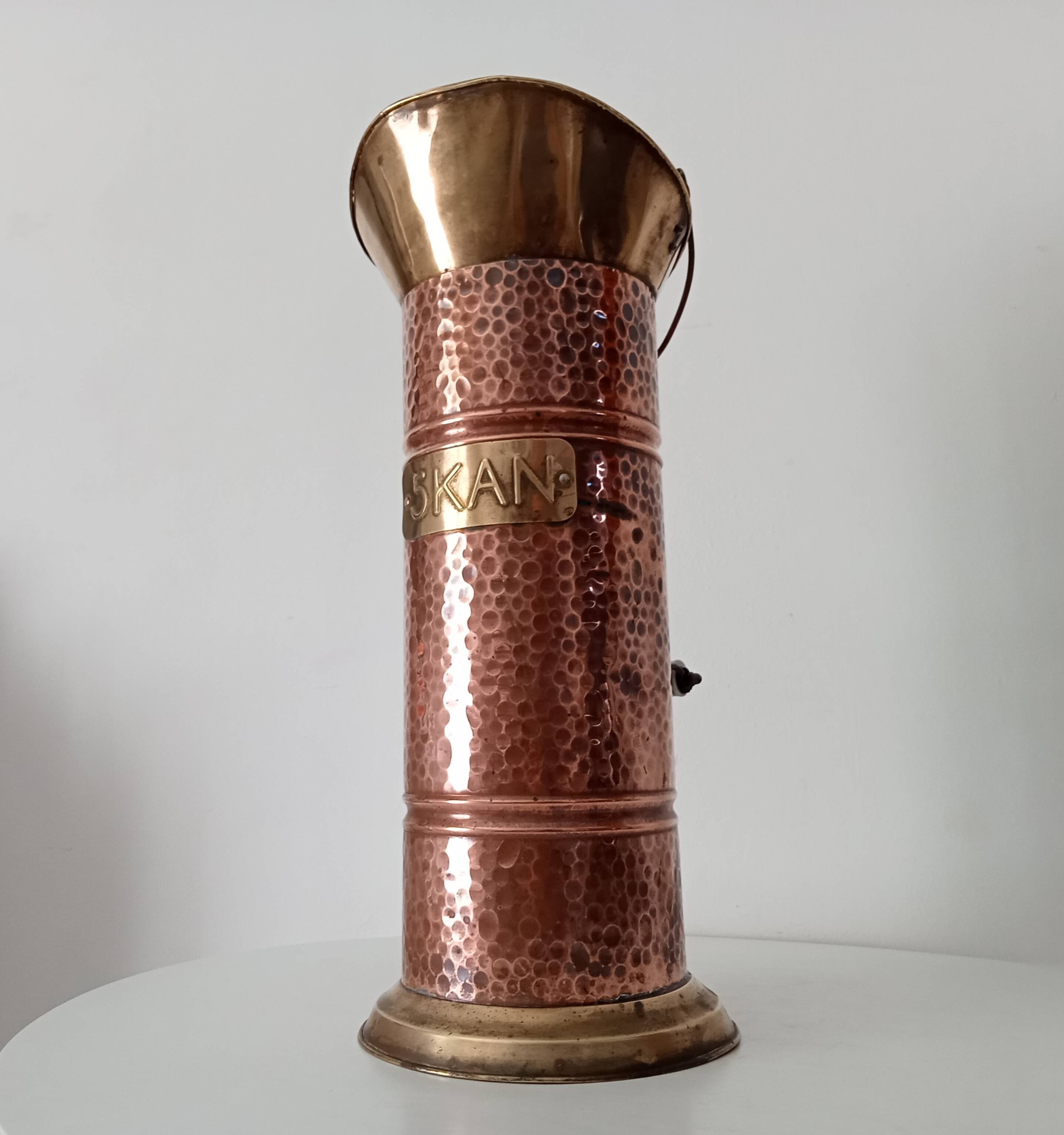 Old umbrella stand in copper, brass and porcelain