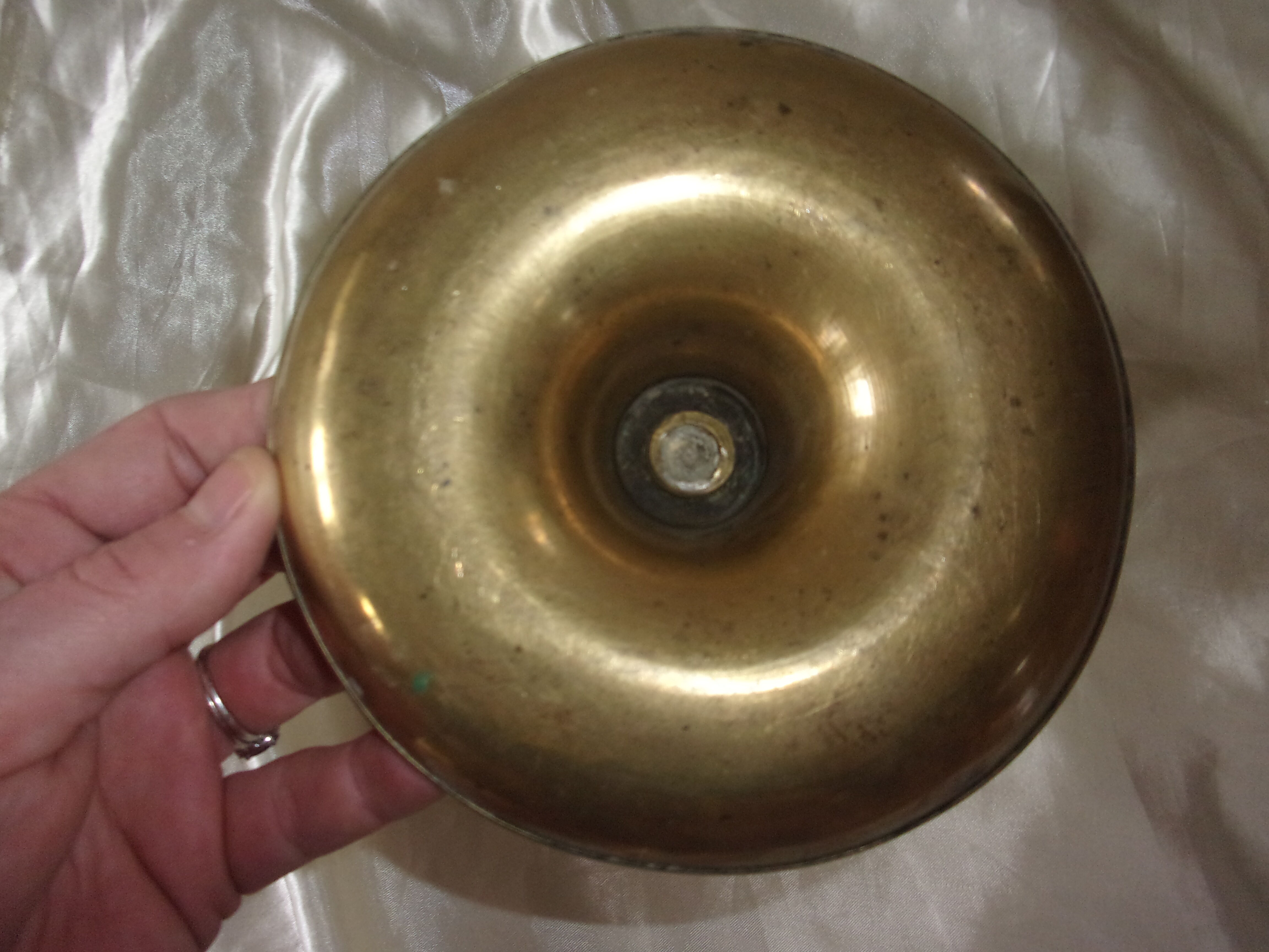 Brass pusher candle holder