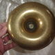 Brass pusher candle holder