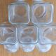 Lot de cinq pots d'apothicaire en verre transparent