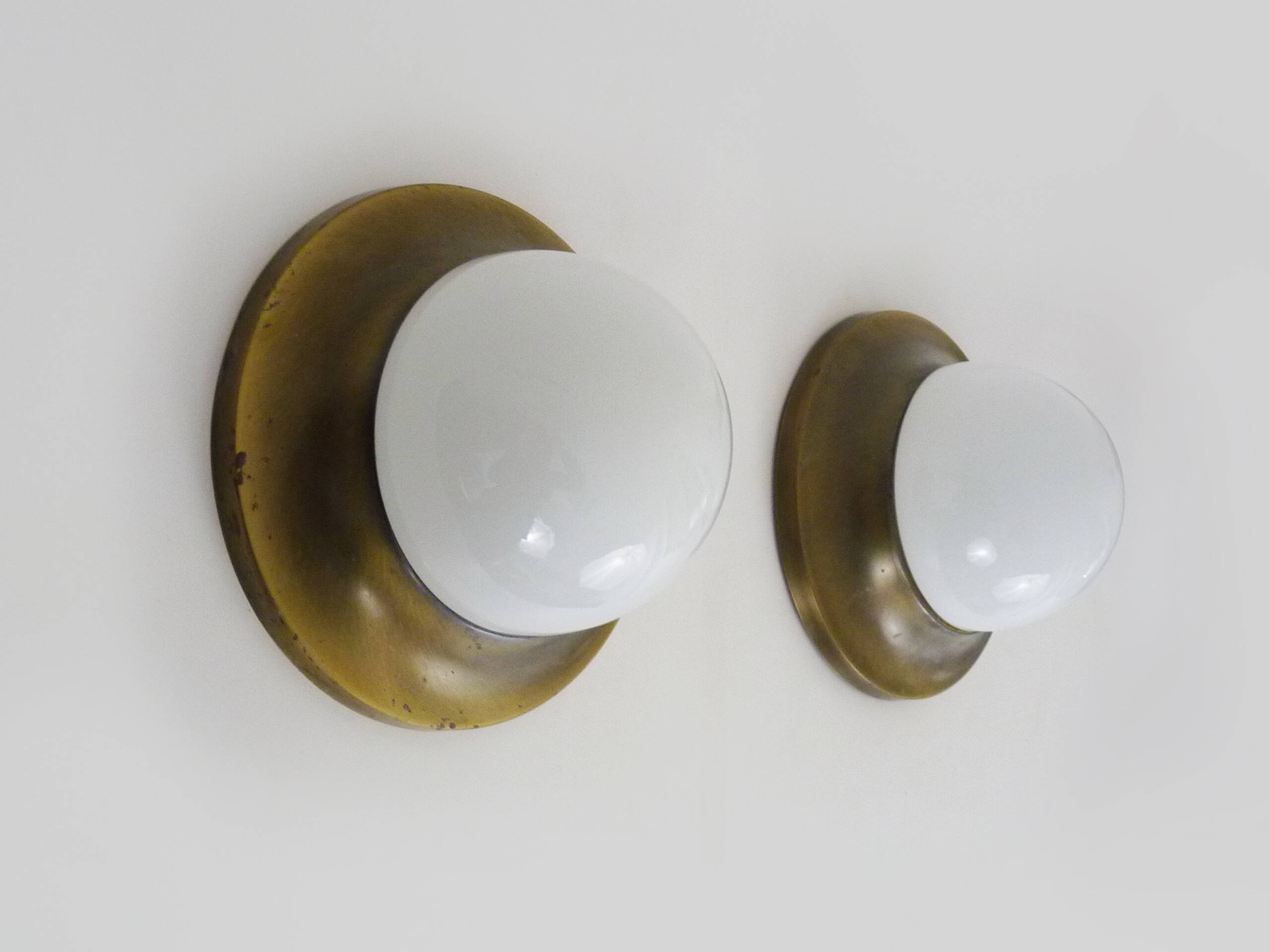Pair of Space age wall lights made in Austria, Opaline gold metal. UFO