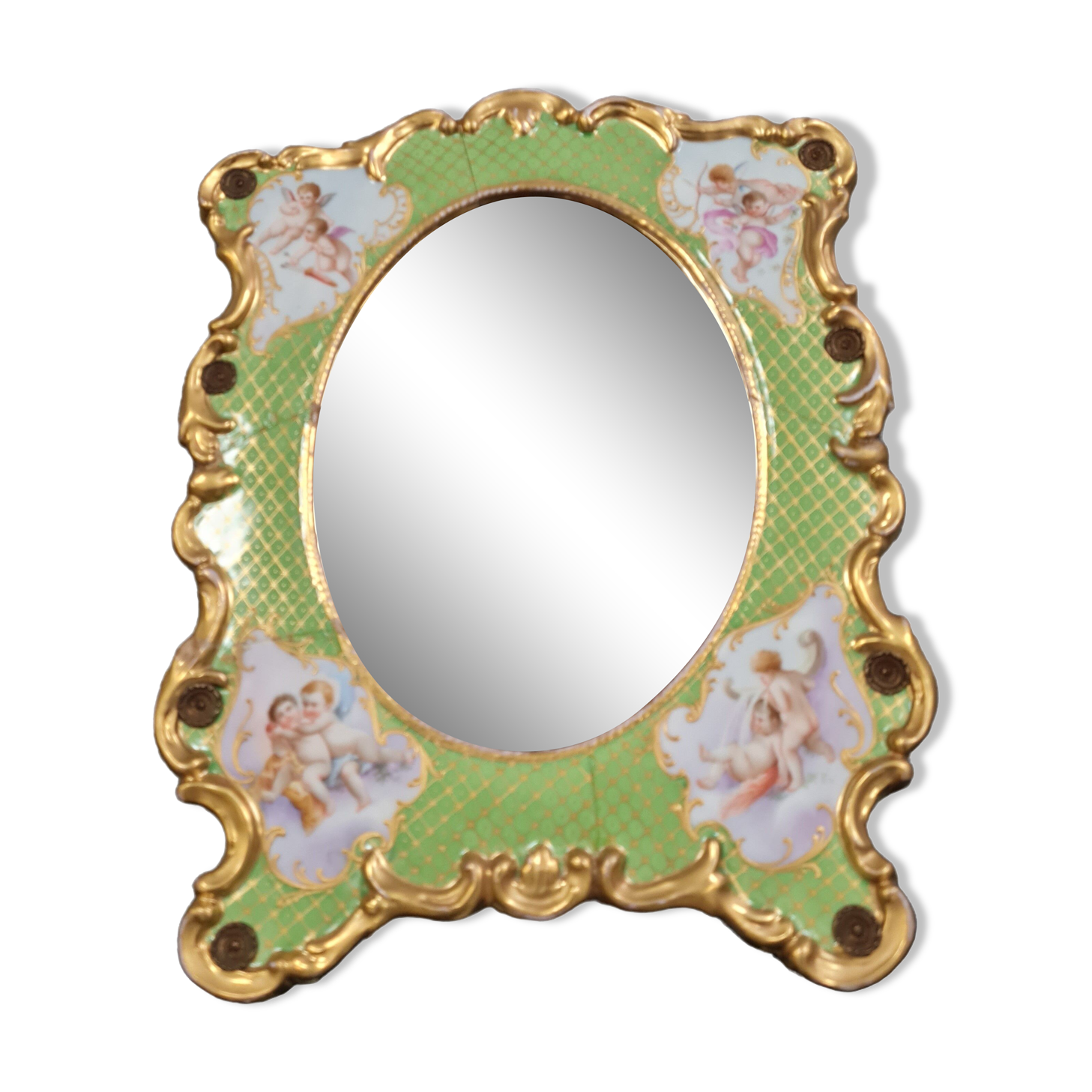 Porcelain mirror with cherub decorations circa 1900