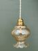 Suspension globe vintage en verre ambré