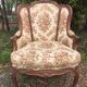 Fauteuil Louis XV dit rocaille en noyer