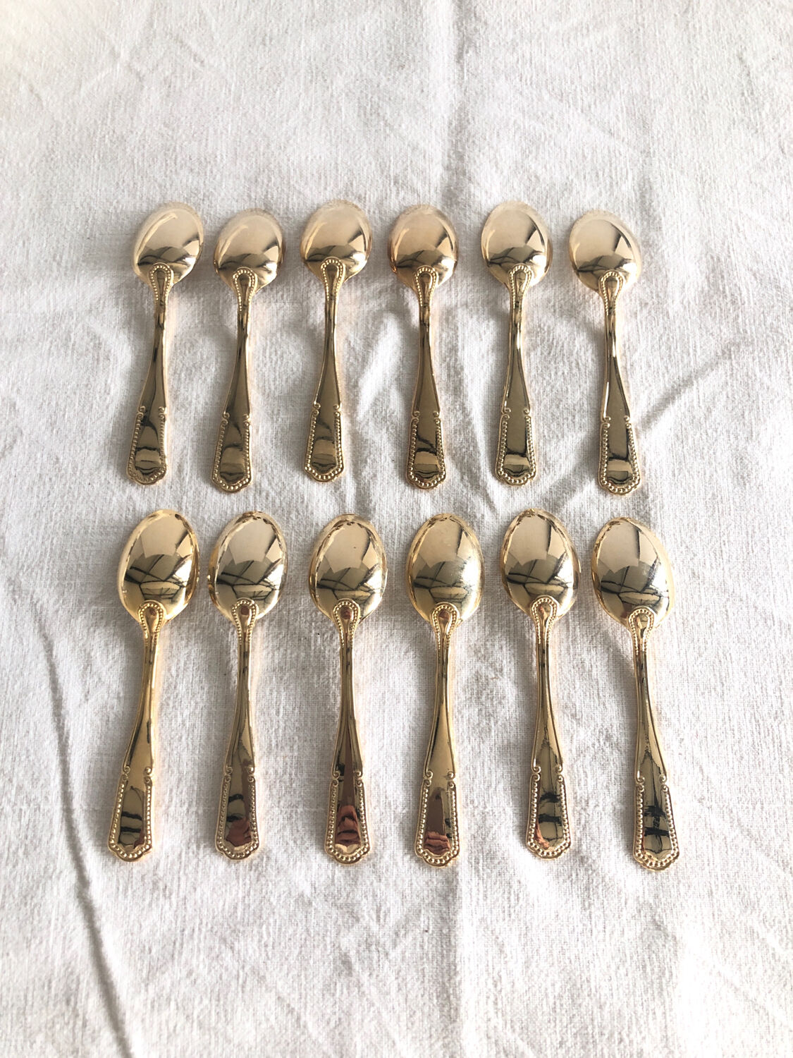 12 small teaspoons in Vintage golden metal