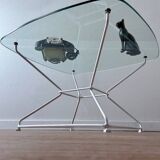 Glass coffee table with steel legs