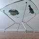Glass coffee table with steel base