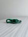 Vintage green glazed ceramic candle holder, organic design.