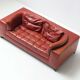 Vintage Osaka loveseat in oxblood leather by Natuzzi Italy