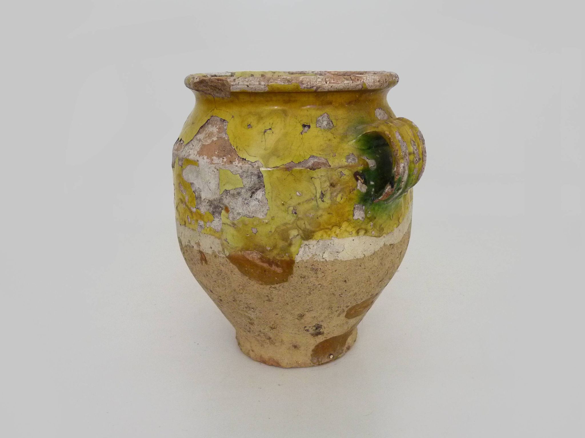 Magnificent glazed yellow confit pot, south-west of France. 19th century.
