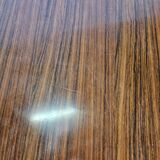 Extendable table in laminate