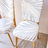 Pair of vintage chairs reupholstered with palm pattern fabric