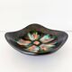 Matte and iridescent black ceramic dish 1960