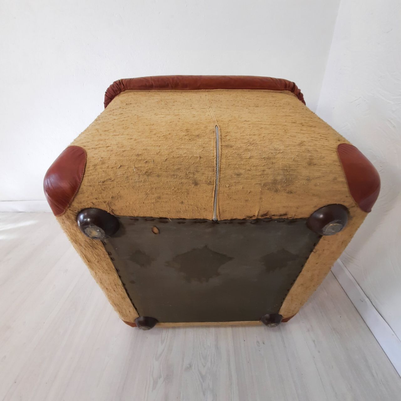 Four vintage armchairs, leather and fabric, 70s