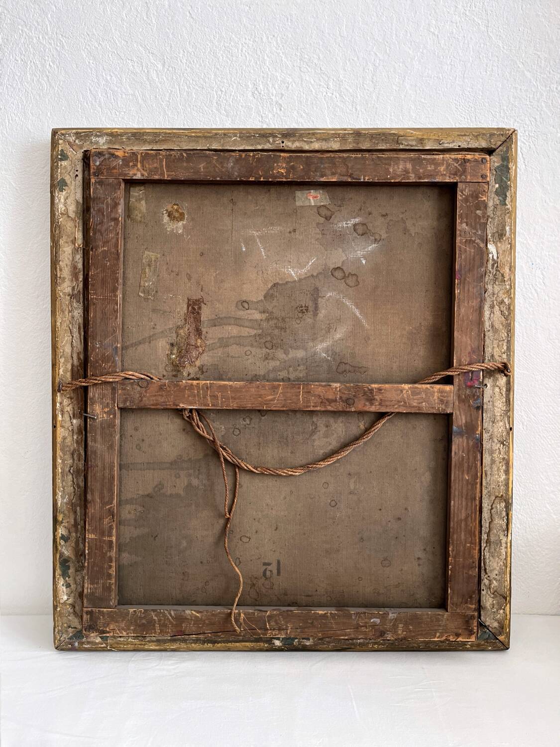 Old oil painting on canvas portrait of a woman with a red bow, late 19th century