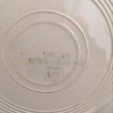 Matching old hollow plates in pink and green.