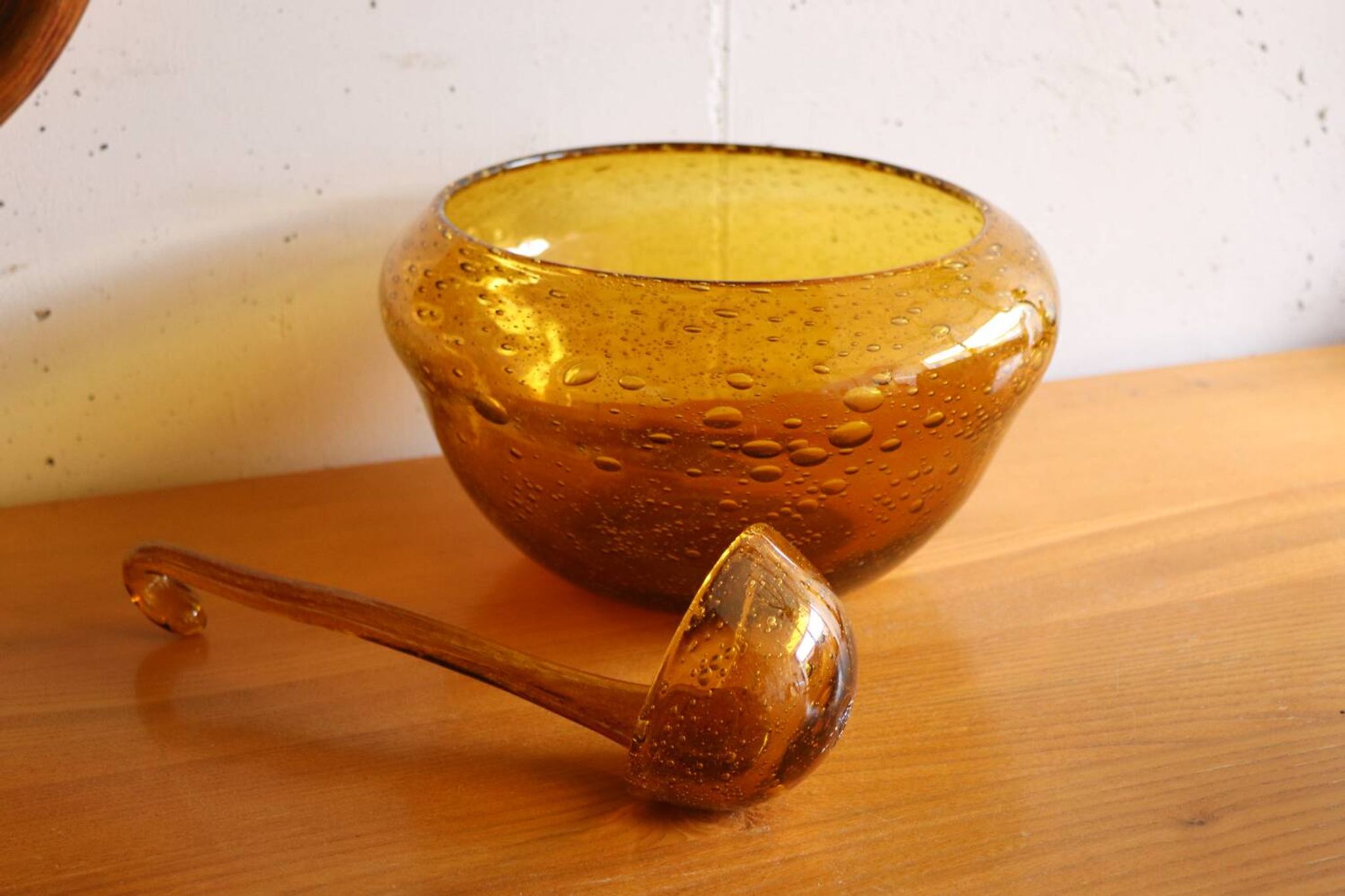 Vintage amber blown bubble glass salad bowl and ladle.