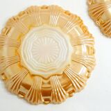 Pair of iridescent orange glass egg plates