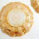 Pair of iridescent orange glass egg plates
