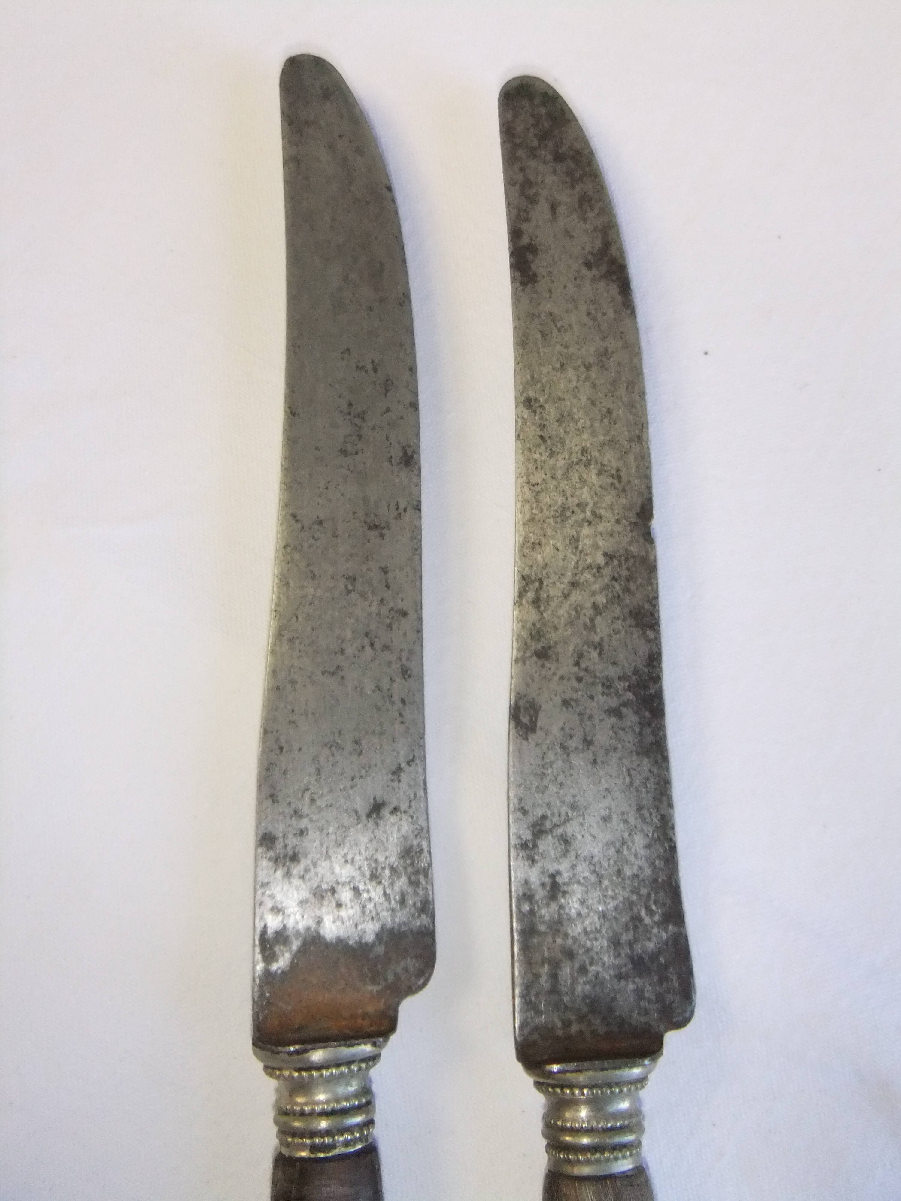 Table service knives old steel blade horn ferrule