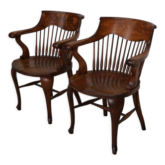 Pair of English Edwardian Oak Spindle Back Captains Office Desk Chairs