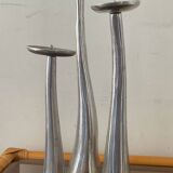 Trio of vintage cast aluminum candlesticks