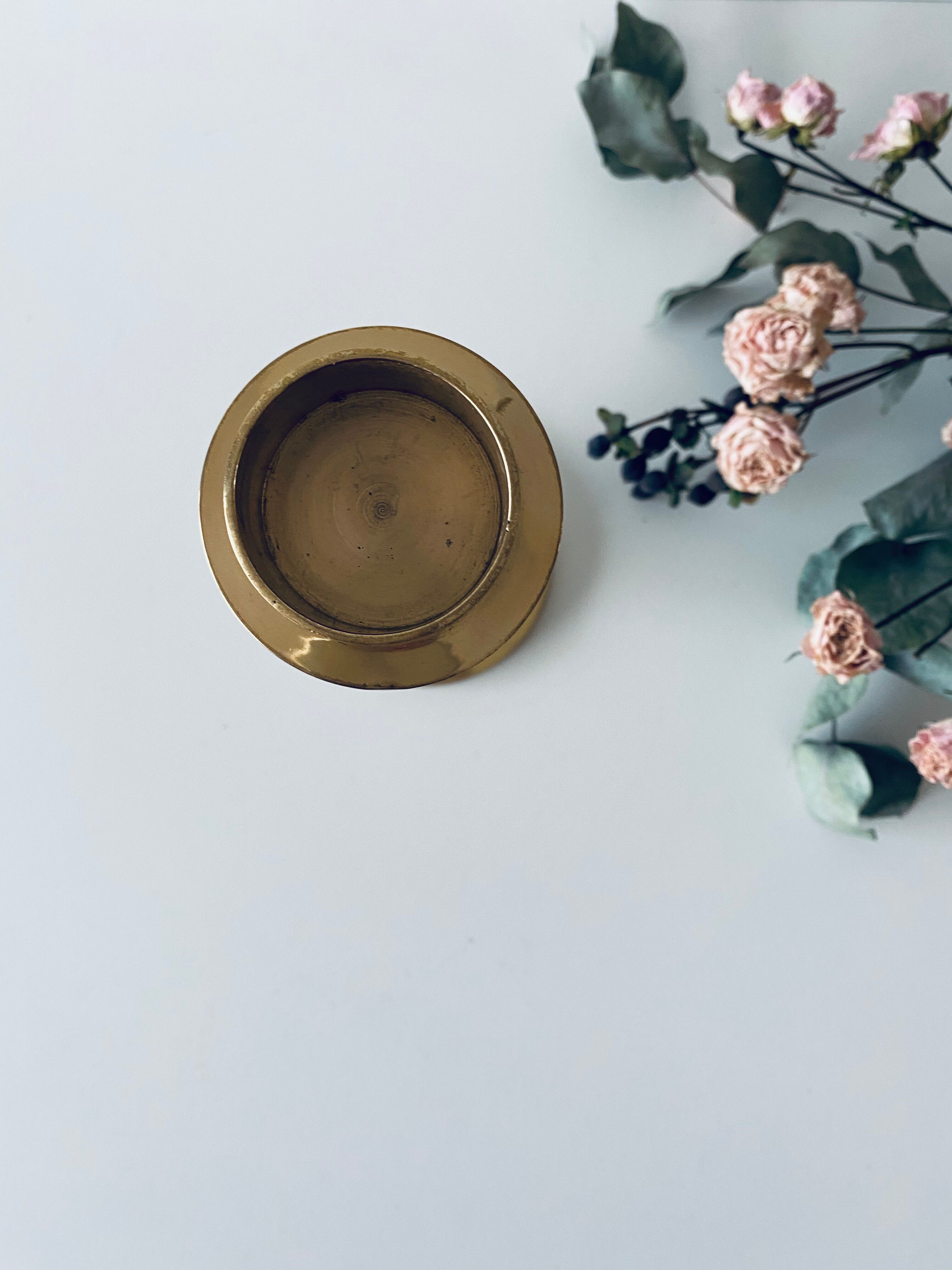 Golden brass candle door