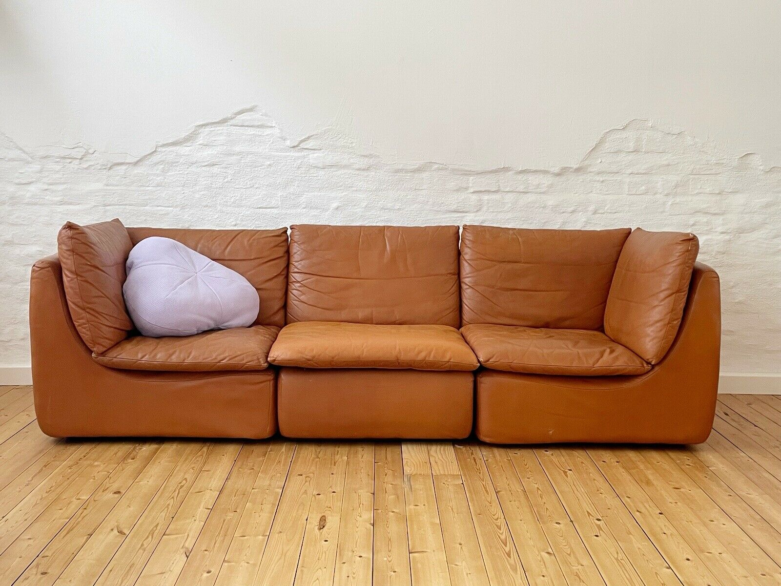 modular sofa of the 70s in tawny leather