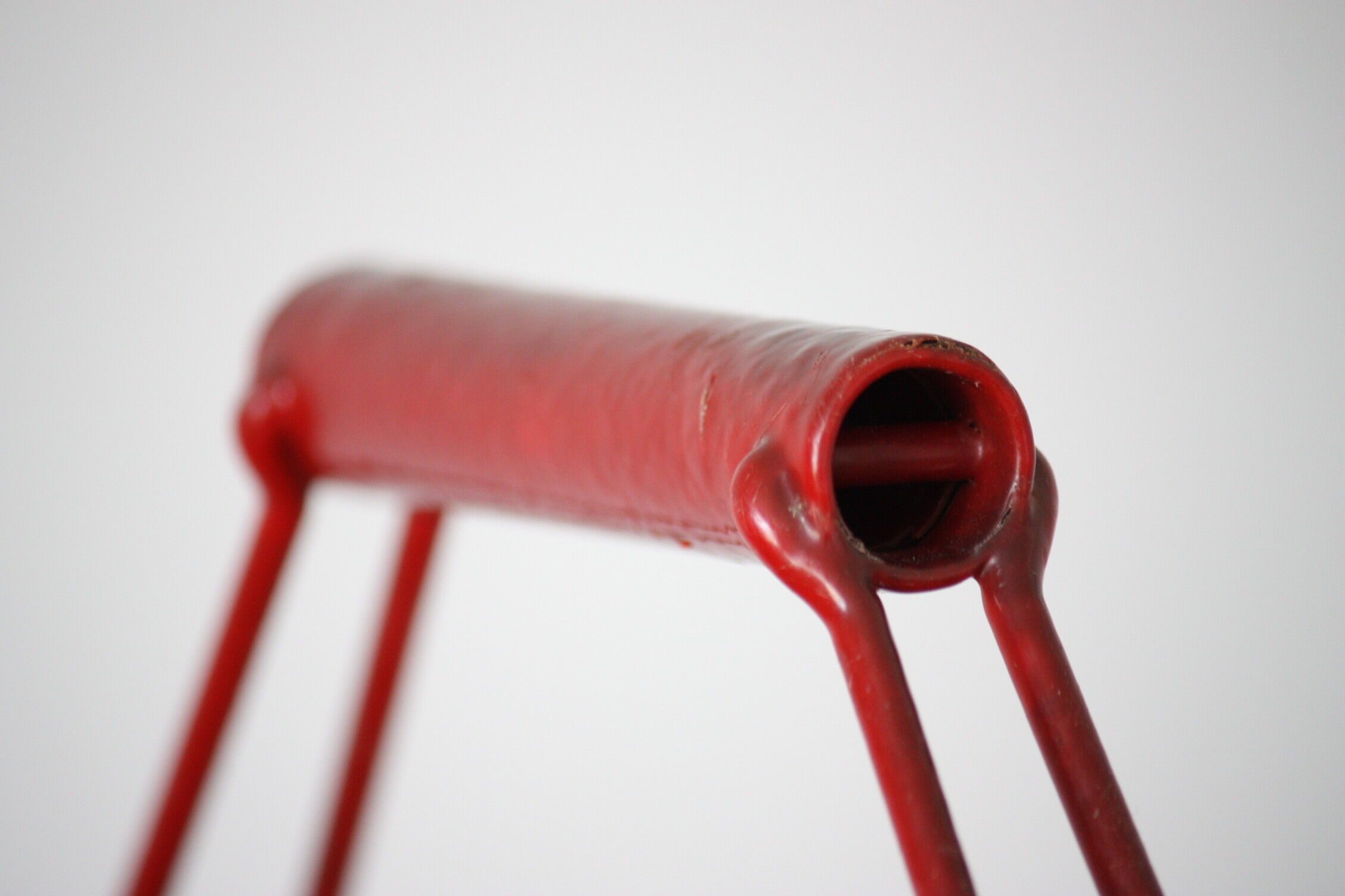 Red metal bottle holder